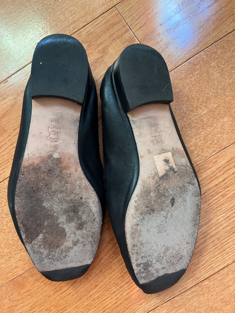 Tory Burch Black Leather Flat Loafer with Gold Trim - Picture 2 of 3